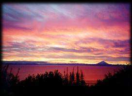 Sunset over Alaska's Cook Inlet just south of the Kenai River.